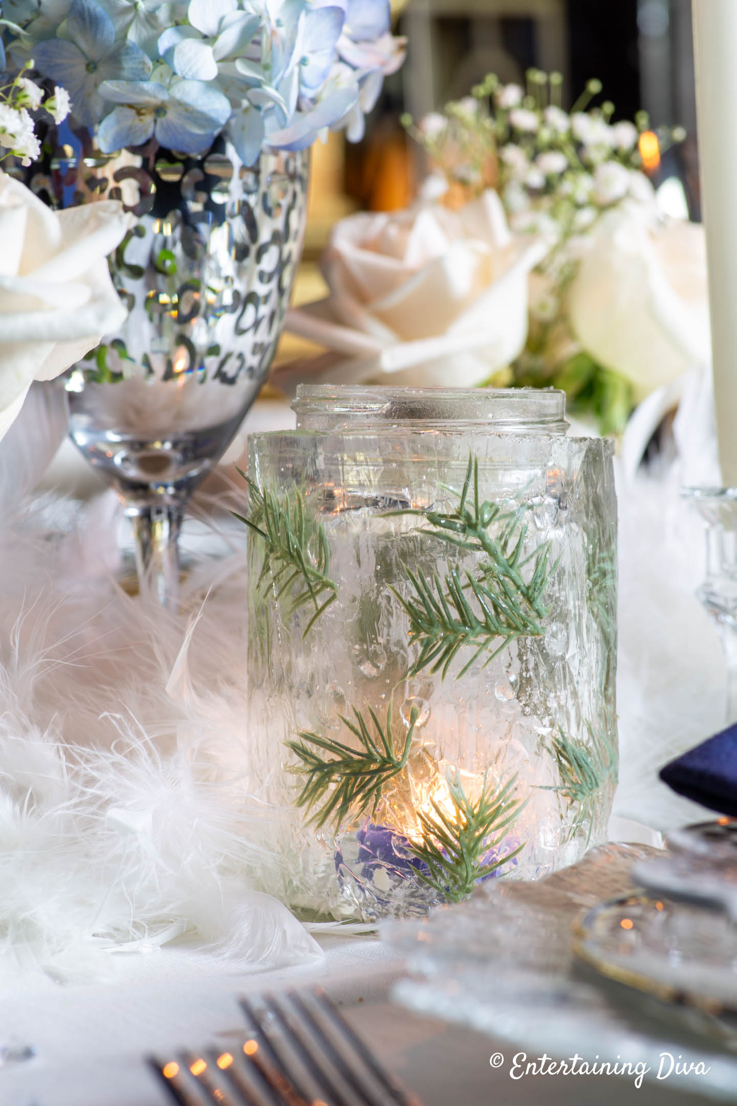 DIY ice candle holder as part of winter wonderland centerpiece