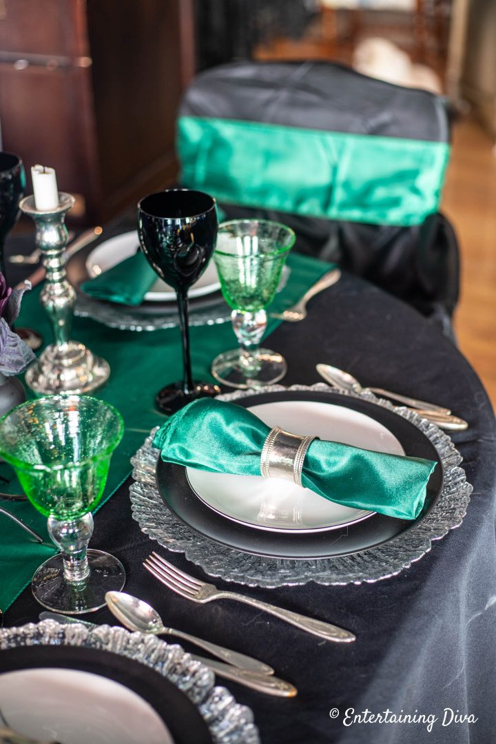 Silver and green Slytherin house place settings used for Harry Potter table decor