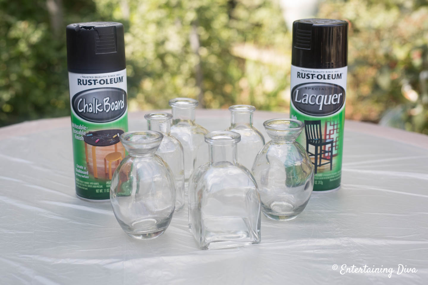 Glass vases with black spray paint