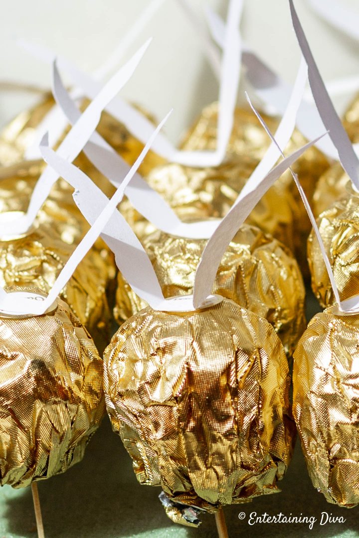 DIY golden snitch wings glued to Ferrero Rocher chocolate truffles