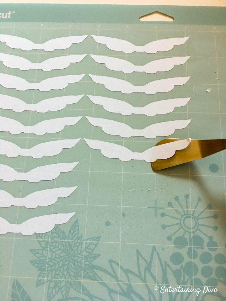 Golden snitch wings cut out on Cricut