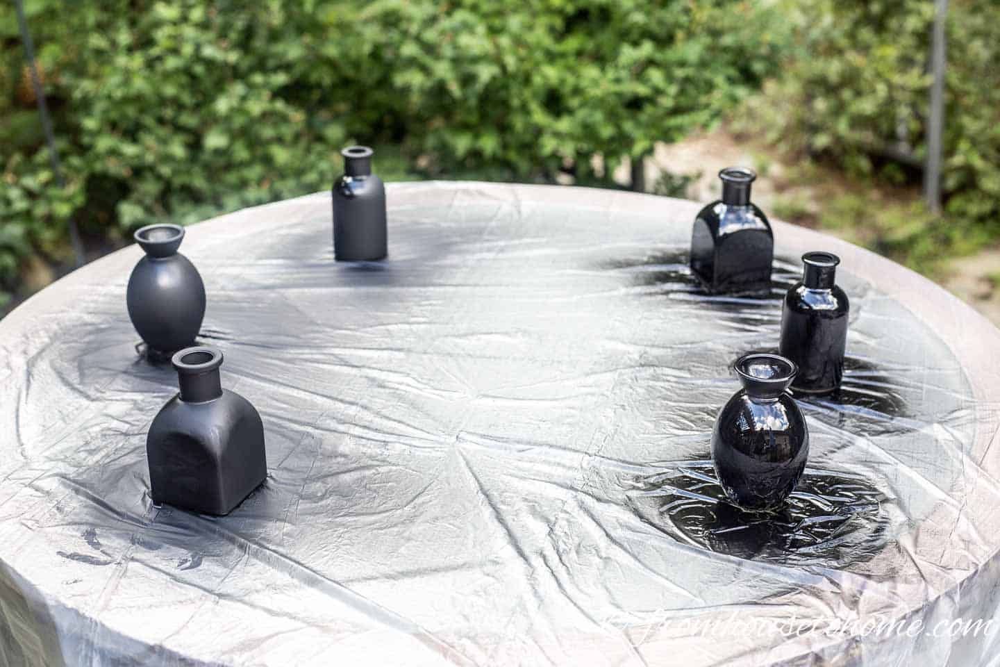Small vases after being spray painted black