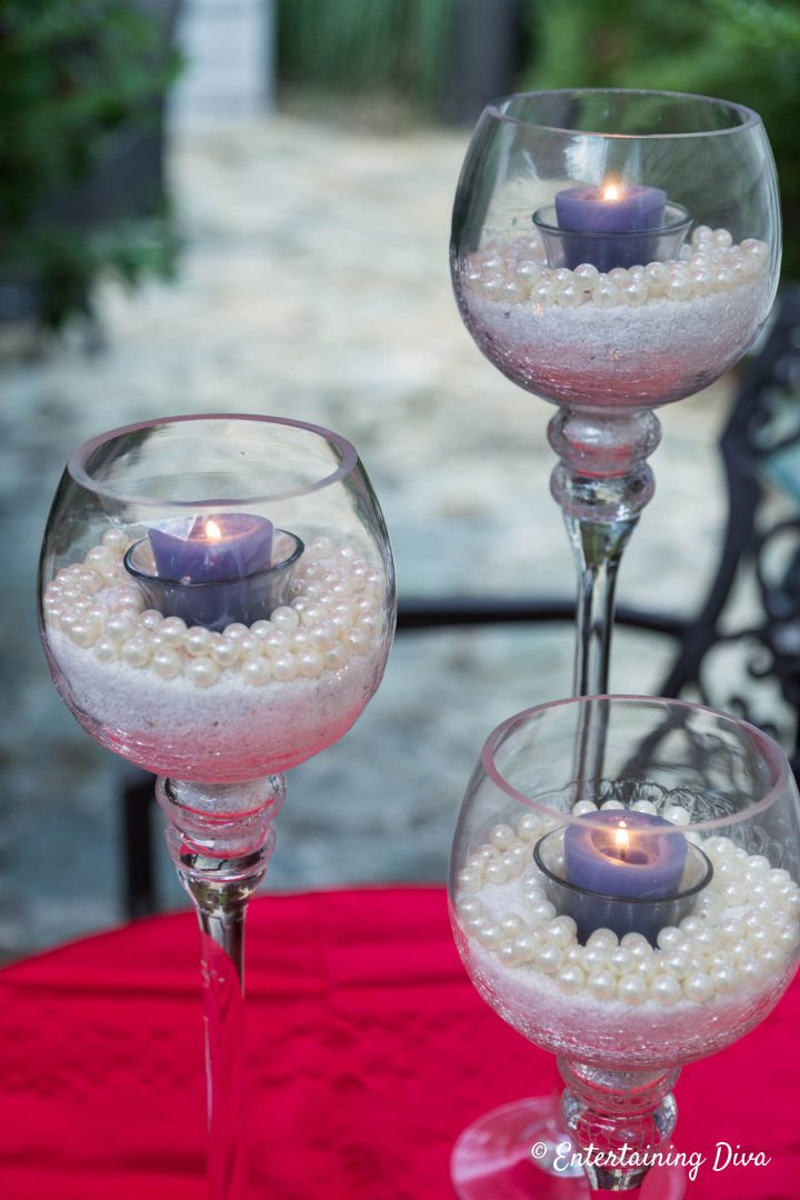 DIY pearl and sand candle holders made with crackle glass stemmed votive holders
