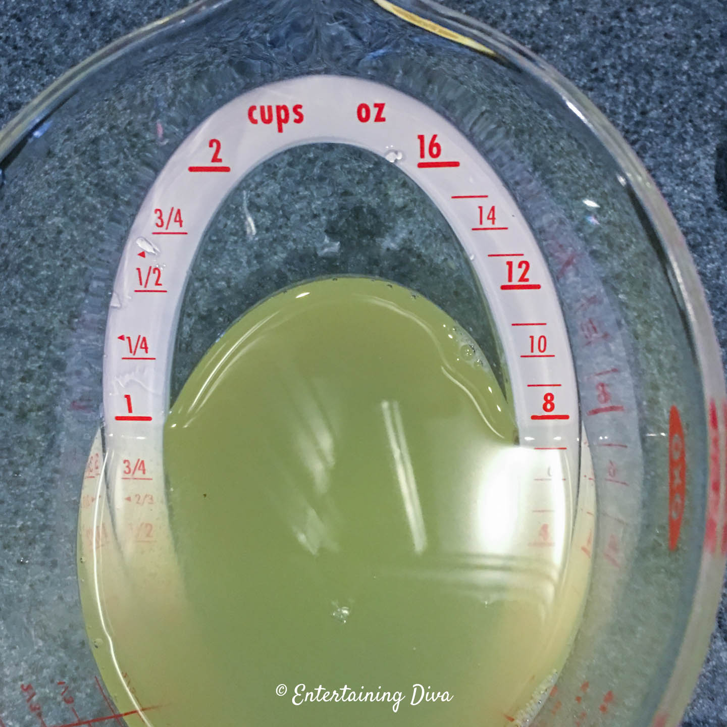 Lemon drop jello shots cold liquid ingredients in a measuring cup Lemon drop jello shots cold liquid ingredients in a measuring cup