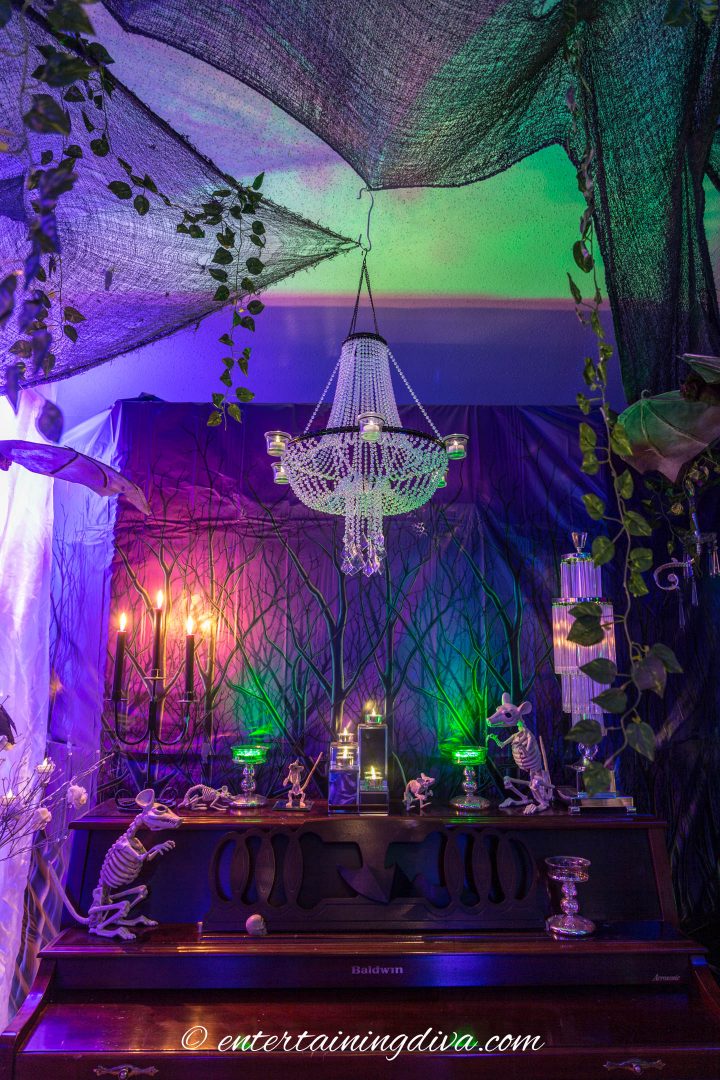 Halloween party decor with skeleton mice on the piano