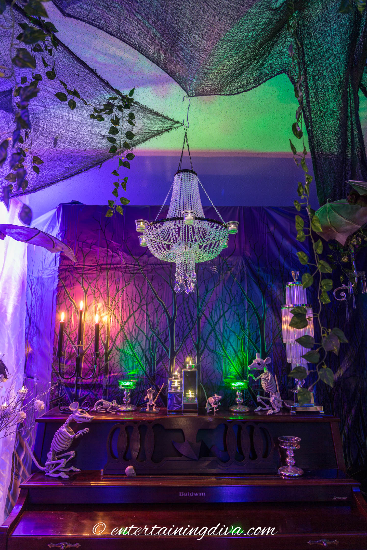 Halloween party decor with skeleton mice on the piano