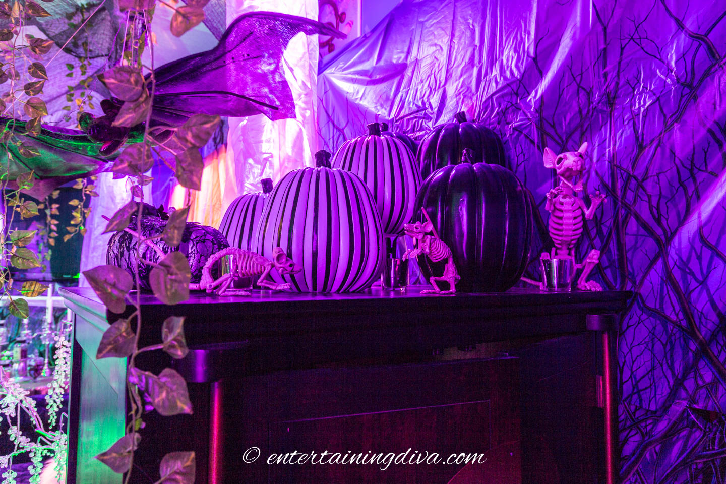 Halloween faux pumpkins and skeleton mice