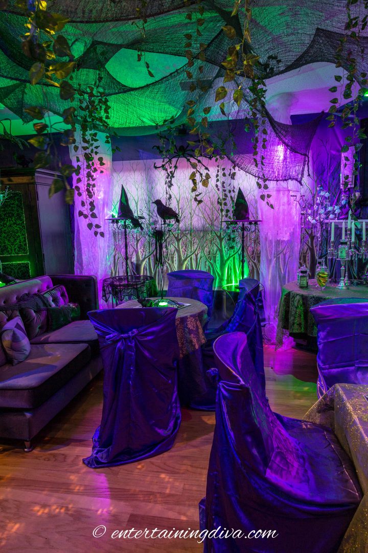 Maleficent party decor with purple chair covers