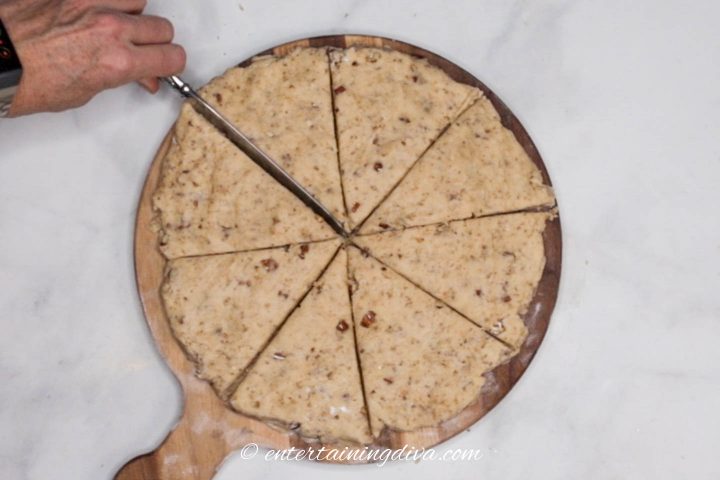 Circle of dough being cut into wedges