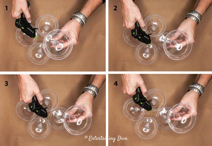 Hot glue the top of the champagne glasses
