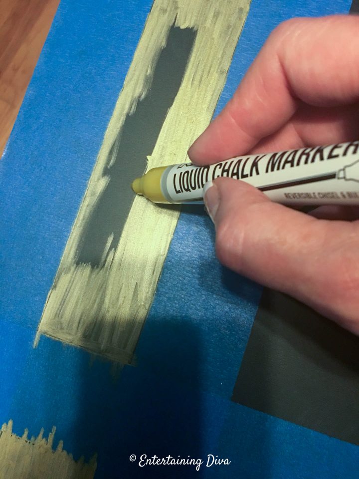 Color in between the tape with gold chalk marker