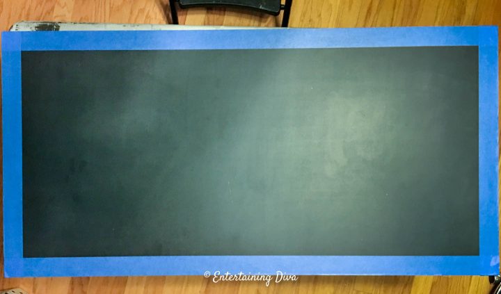 Tape around the edge of the chalkboard
