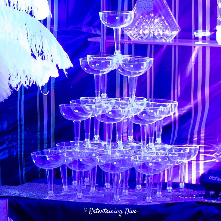 Champagne glass tower on the bar at a roaring 20s party