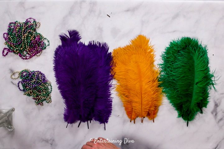 DIY Mardi Gras feather centerpiece supplies