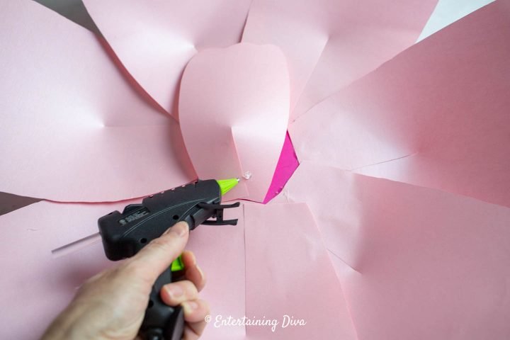 Where to put the glue for the second layer of petals