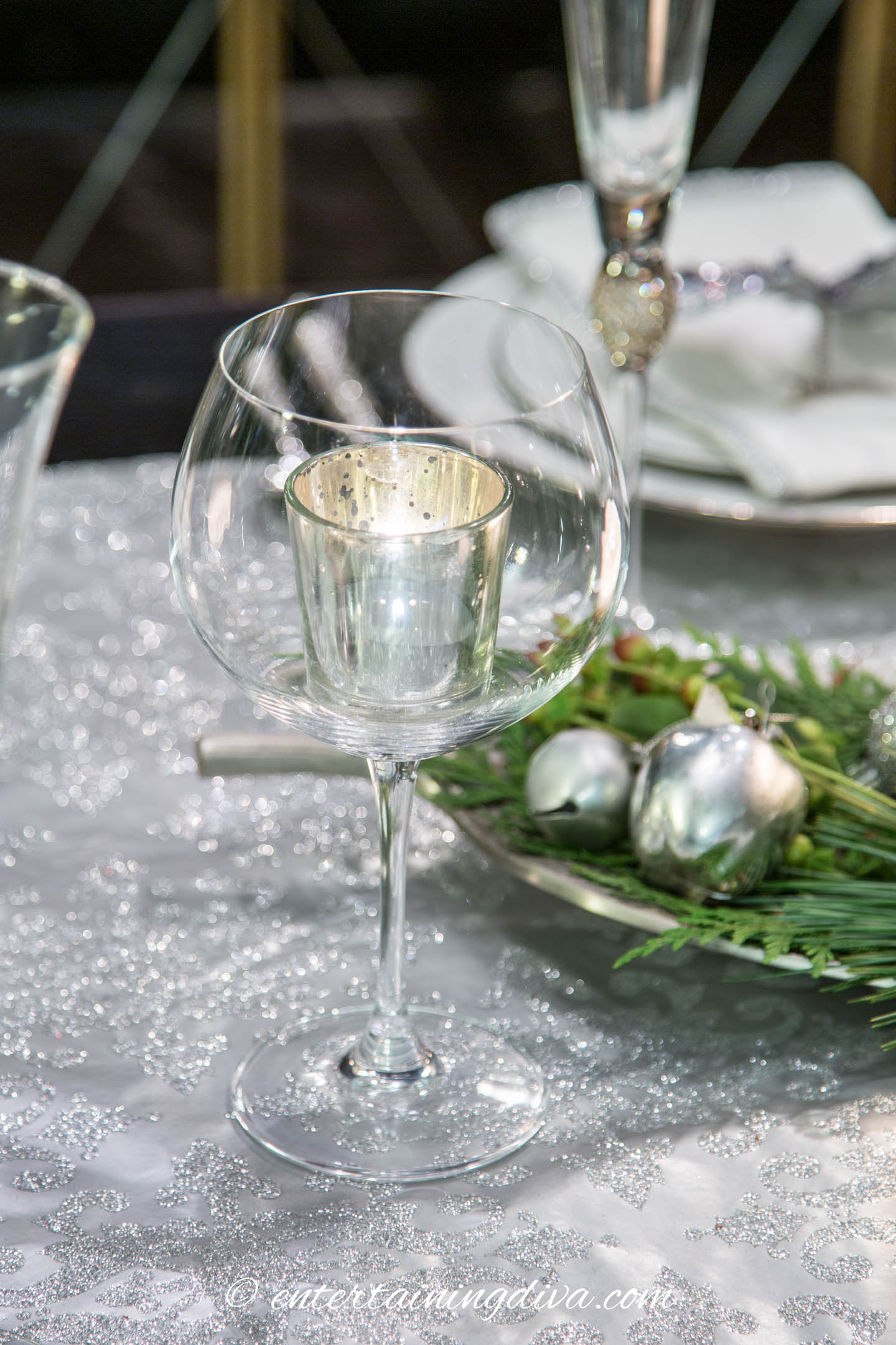 Simple candle holder made from a wine glass