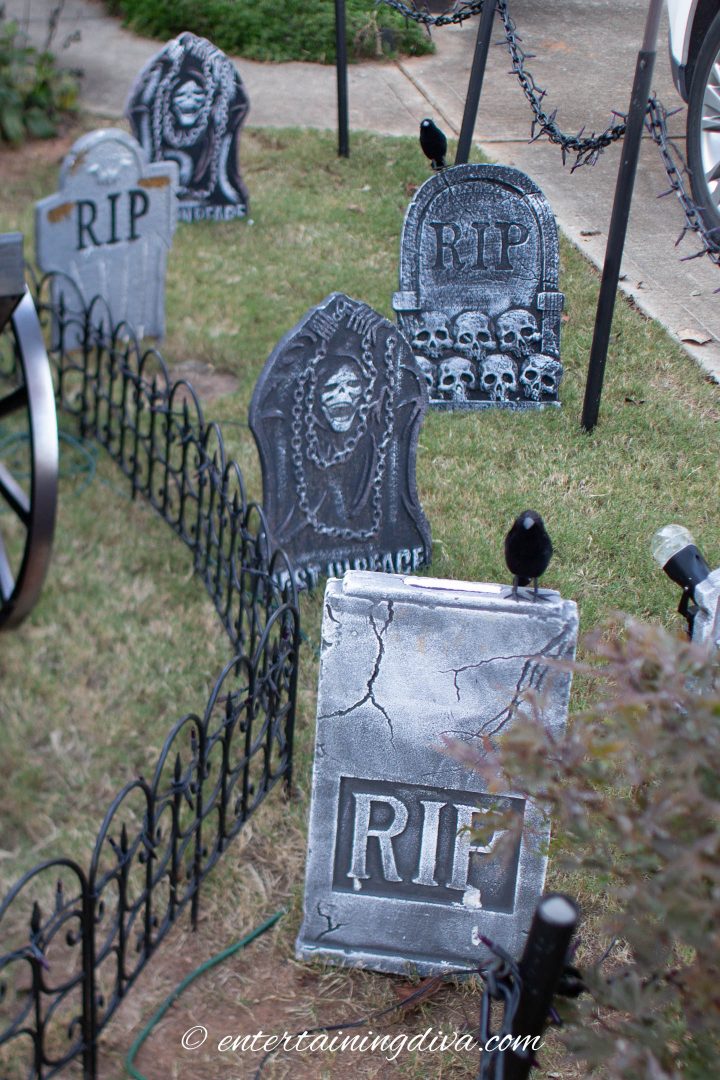 Halloween graveyard made with tombstones in the yard 