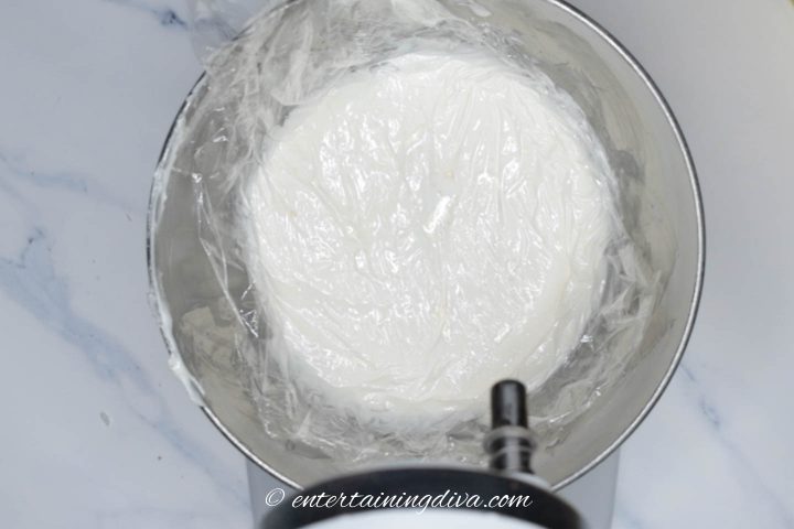 Royal icing covered with plastic wrap