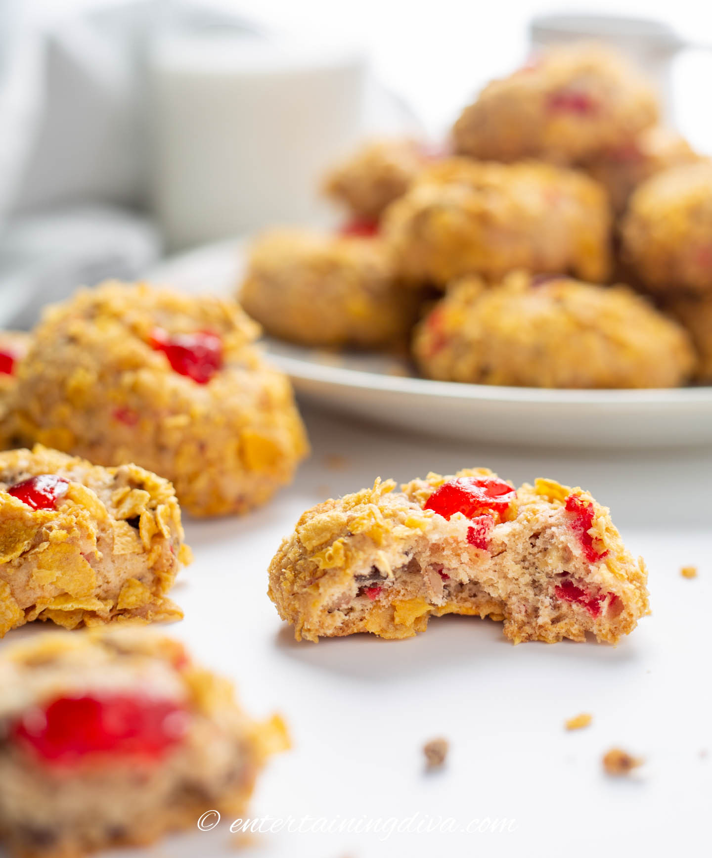 Close up of cherry winks cookies, one with a bite out of it