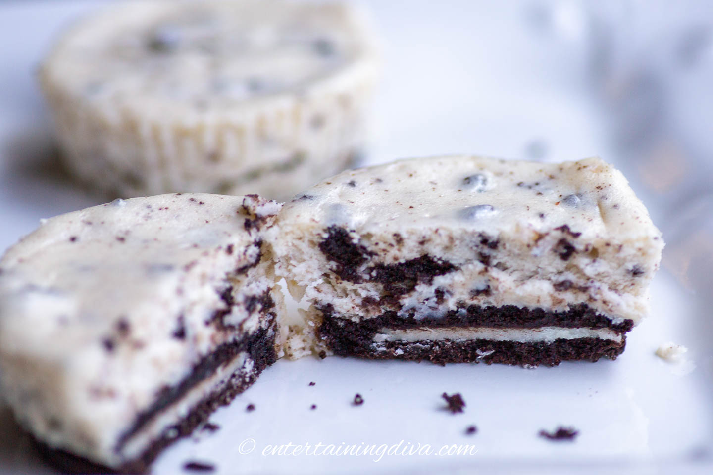 An Oreo cheesecake bite cut in half