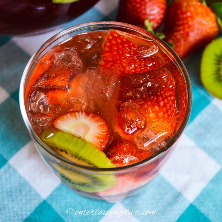 top view of strawberry kiwi sangria in a glass