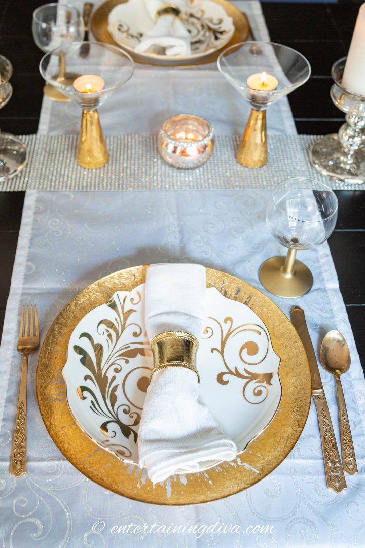 White and gold place setting with the spray painted gold-stemmed wine glass