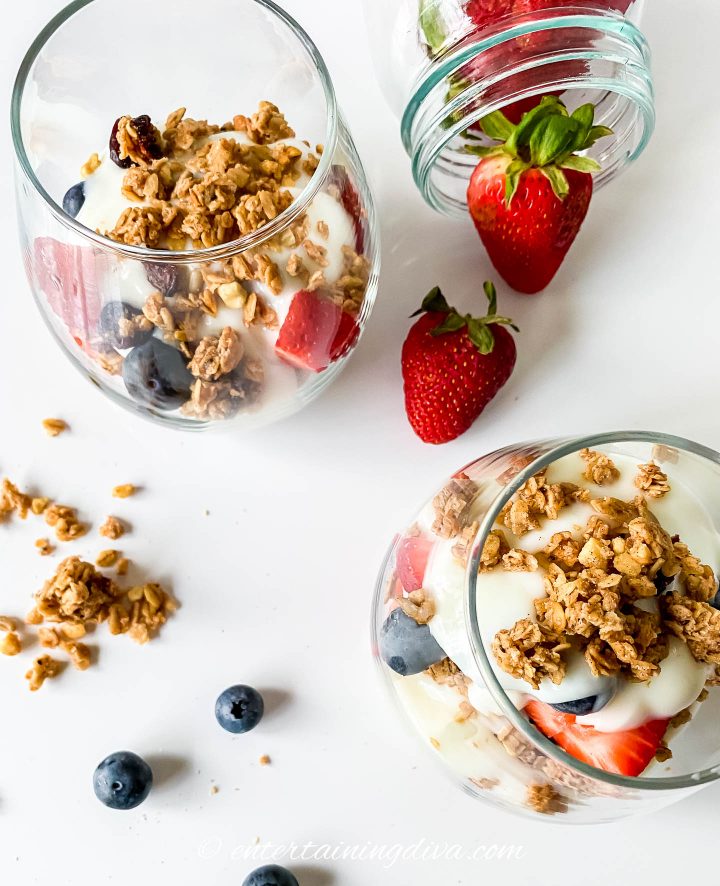 Putting together the strawberry blueberry yogurt parfait