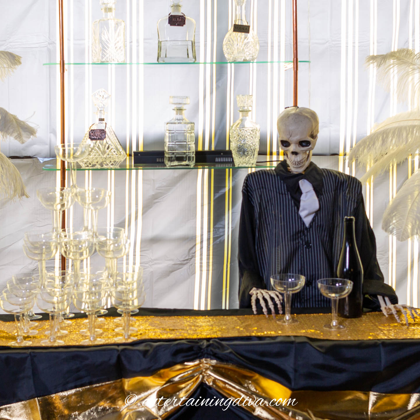 Skeleton bartender in front of a shelf with liquor bottles