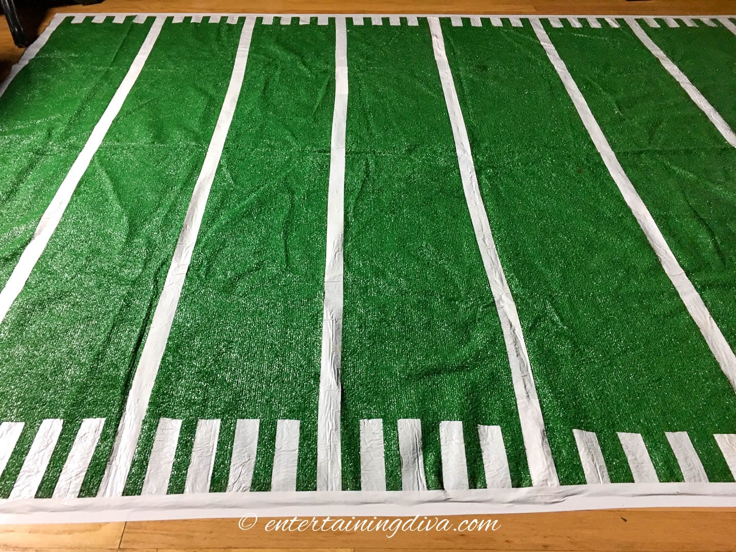DIY football field area rug on the floor