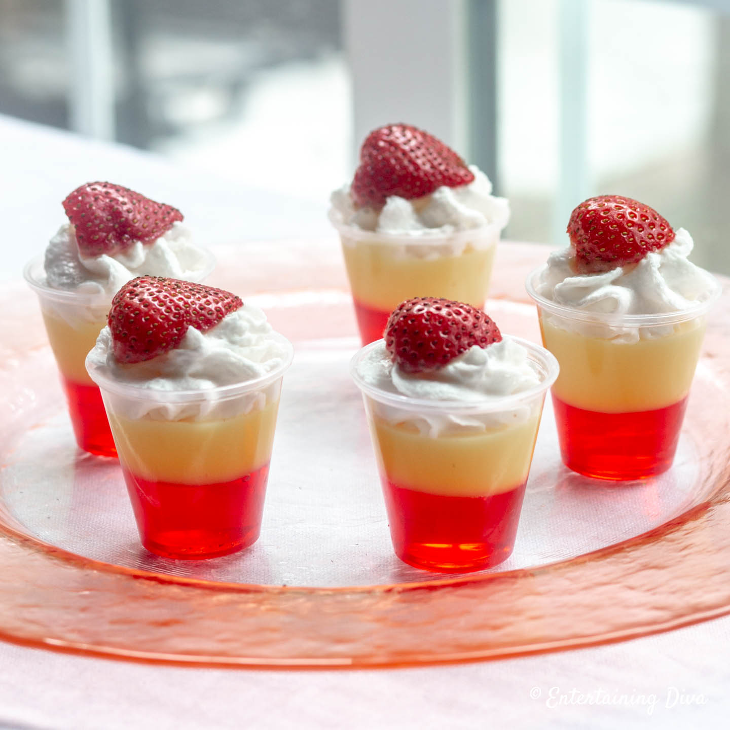 Strawberries and Cream Layered Jello Shots