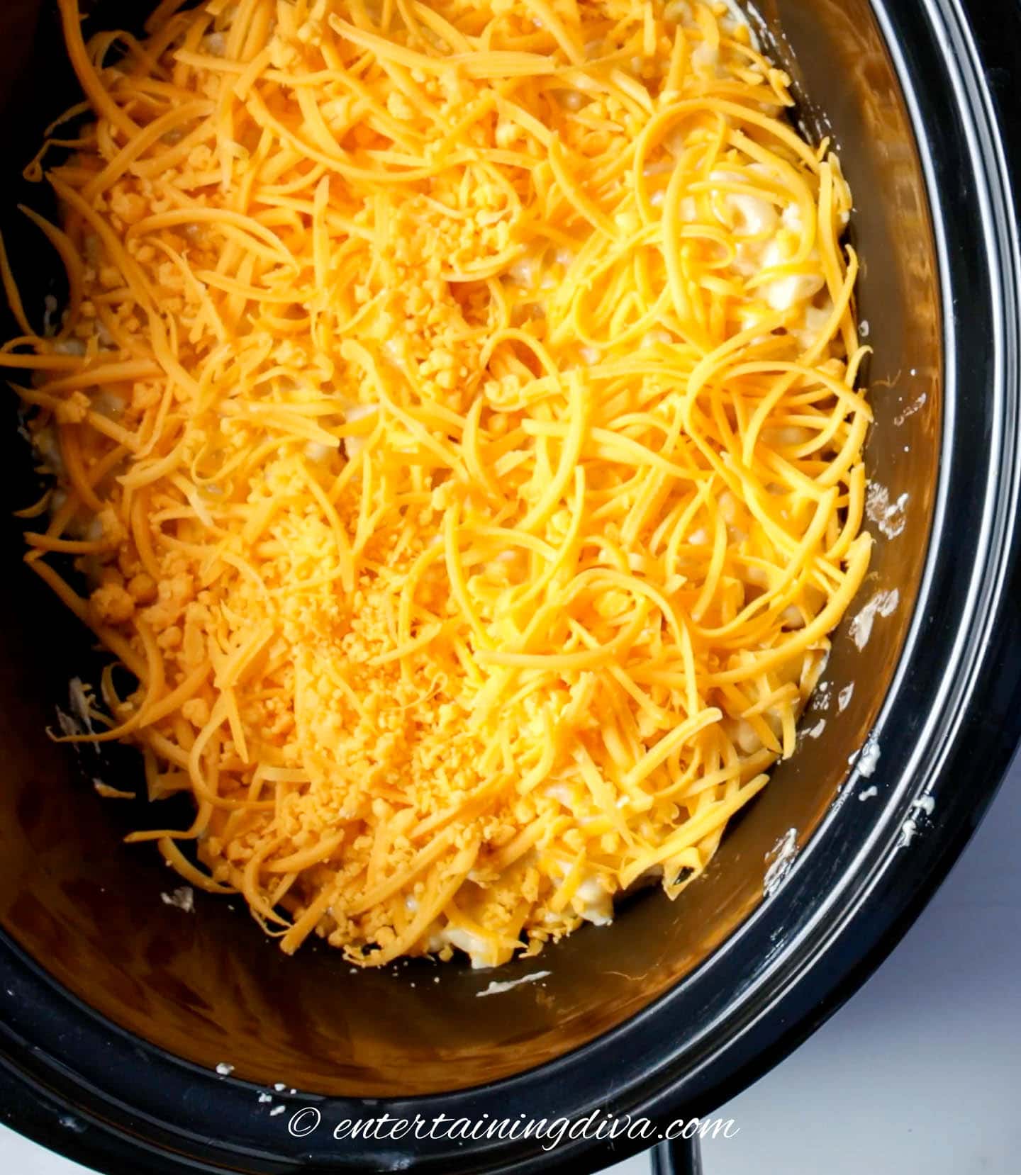 macaroni and cheese in the crock pot before cooking