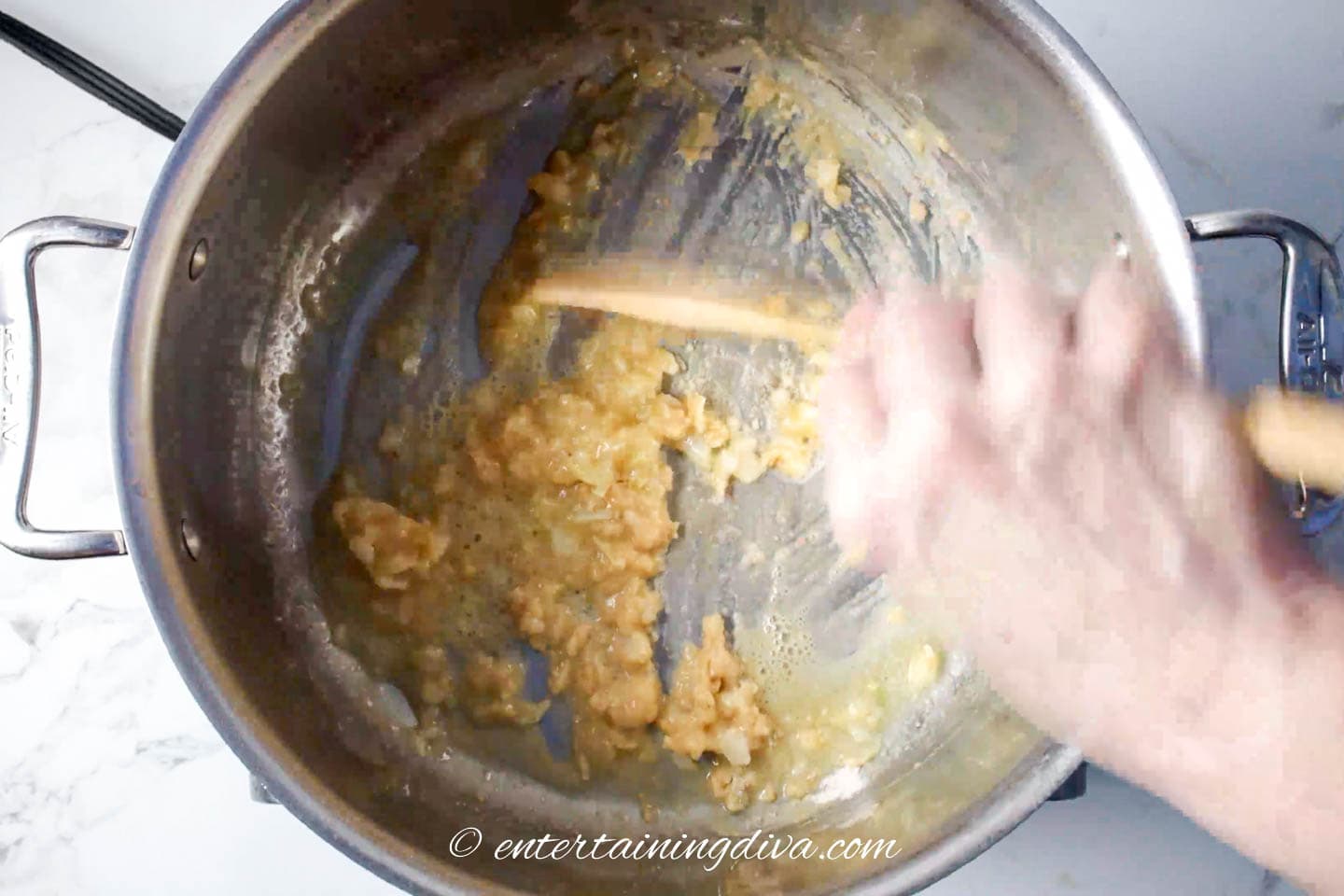 onion and flour cooking in pot