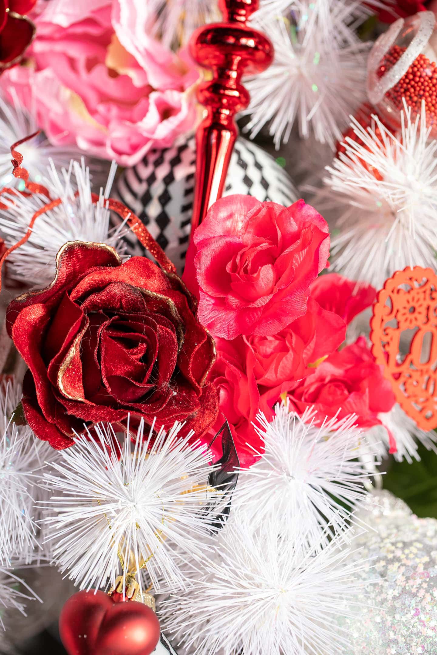 Close up of red roses on a white Valentine's Day tree