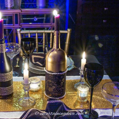 DIY black lace and gold wine bottle candleholder
