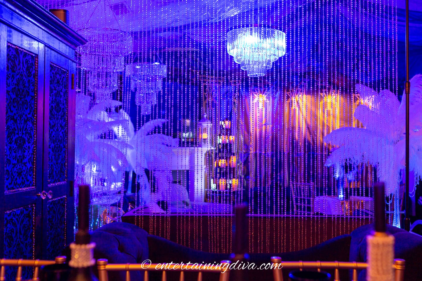 Clear beaded curtains used as a divider between the dance floor and the eating area