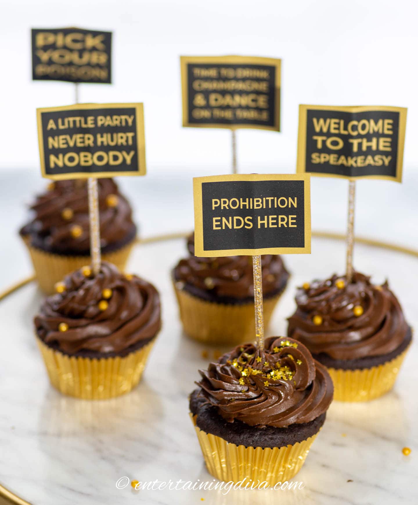Chocolate cupcakes with gold sprinkles and Great Gatsby cupcake toppers