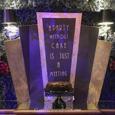 DIY Great Gatsby dessert table backdrop with the text 