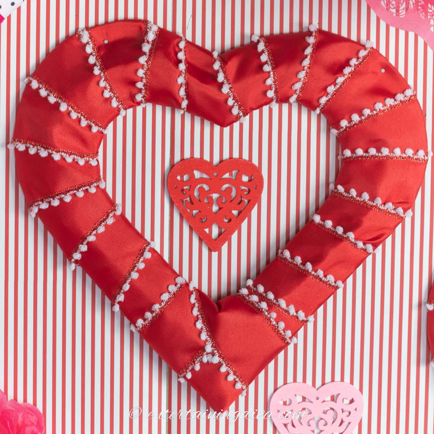 DIY heart wreath made with red and white ribbon