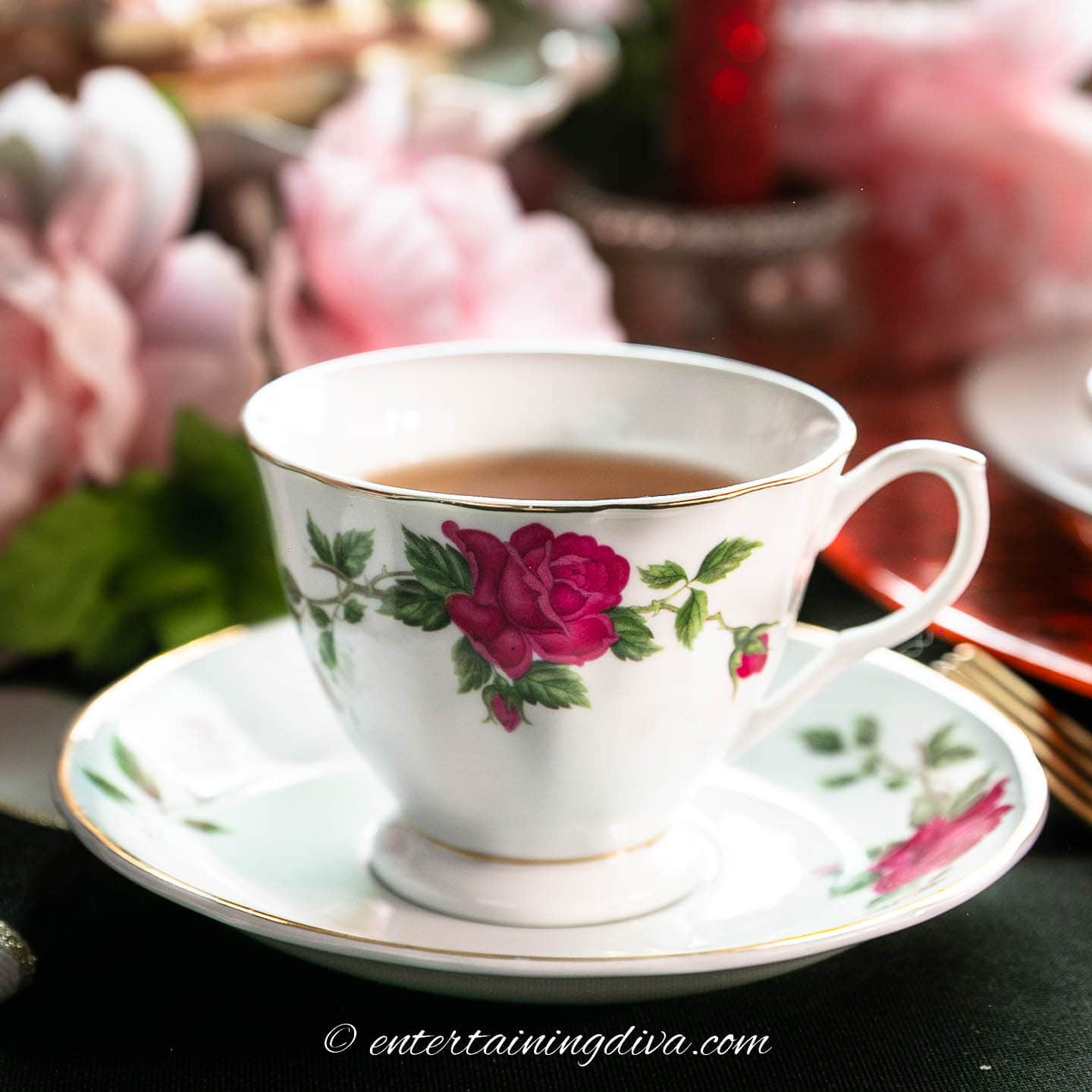 Traditional tea cup and saucer with tea in it