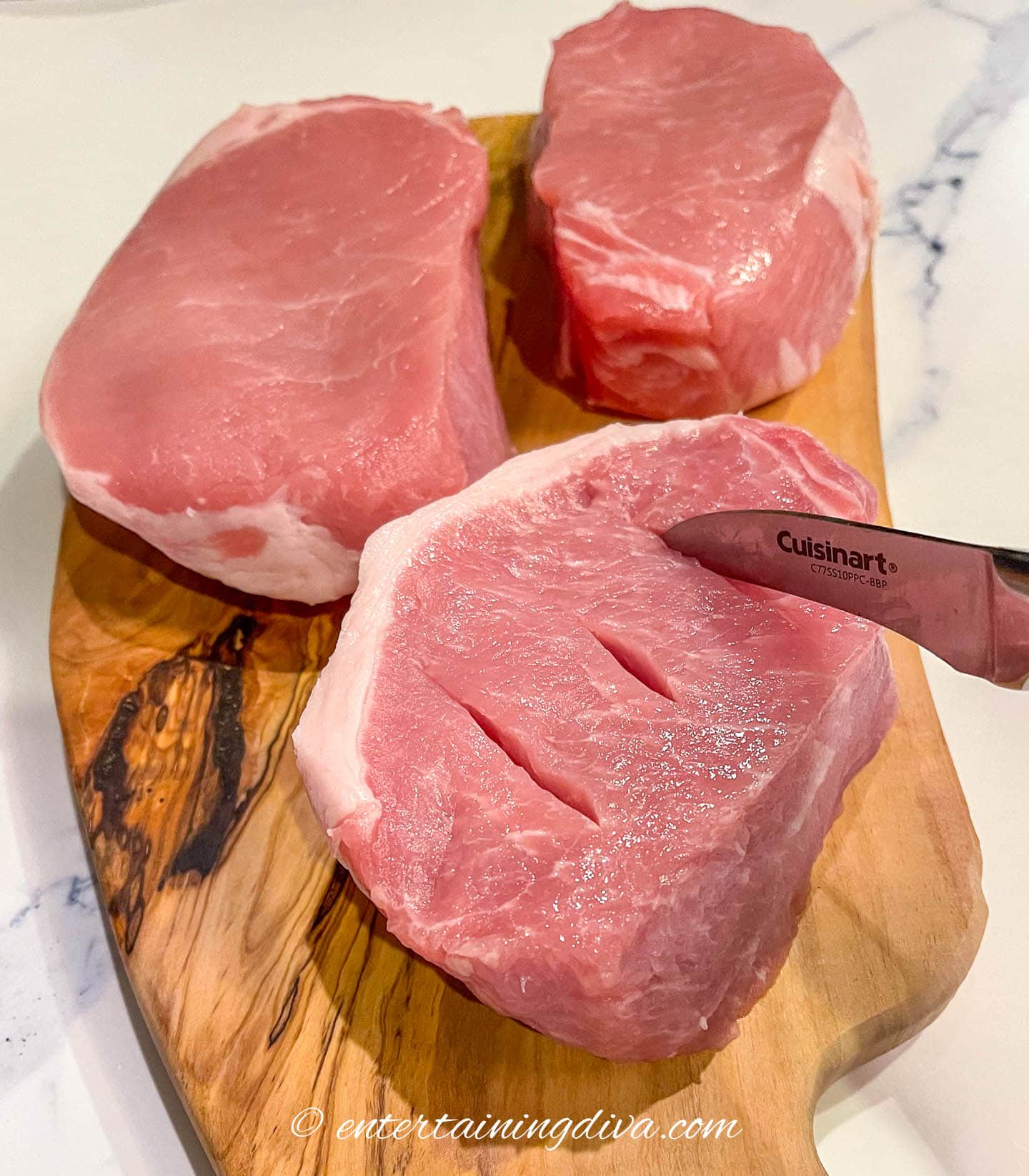 cutting slits in thick cut pork chops