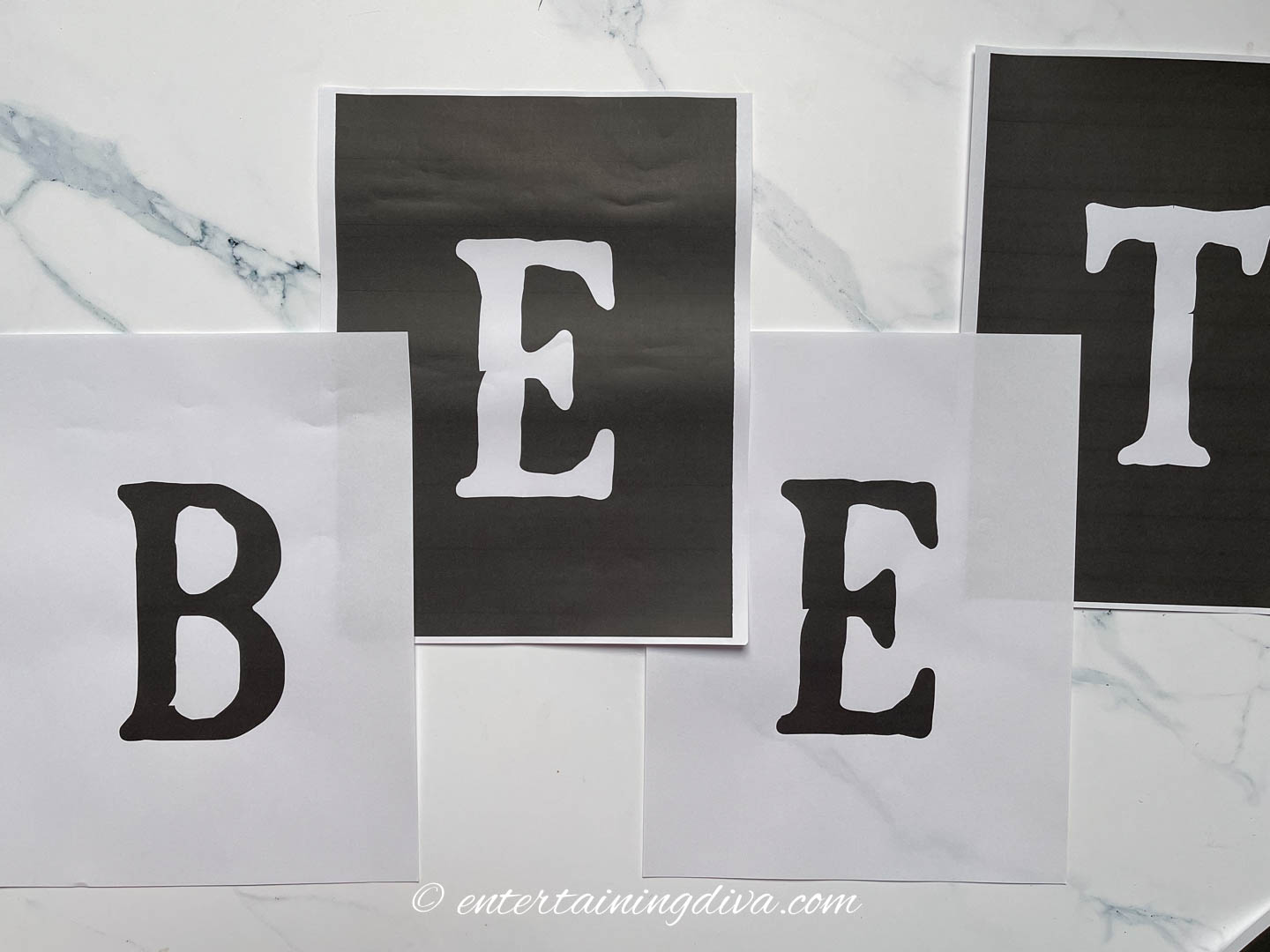 Beetlejuice banner letters arranged on a table