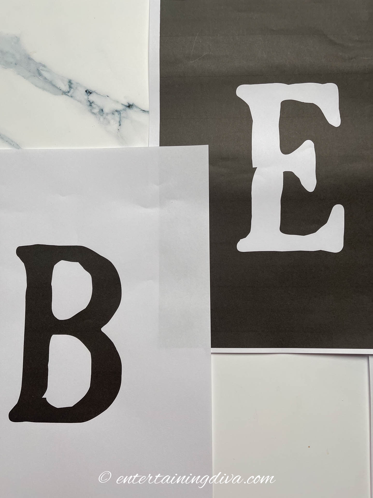 Two banner letters glued together
