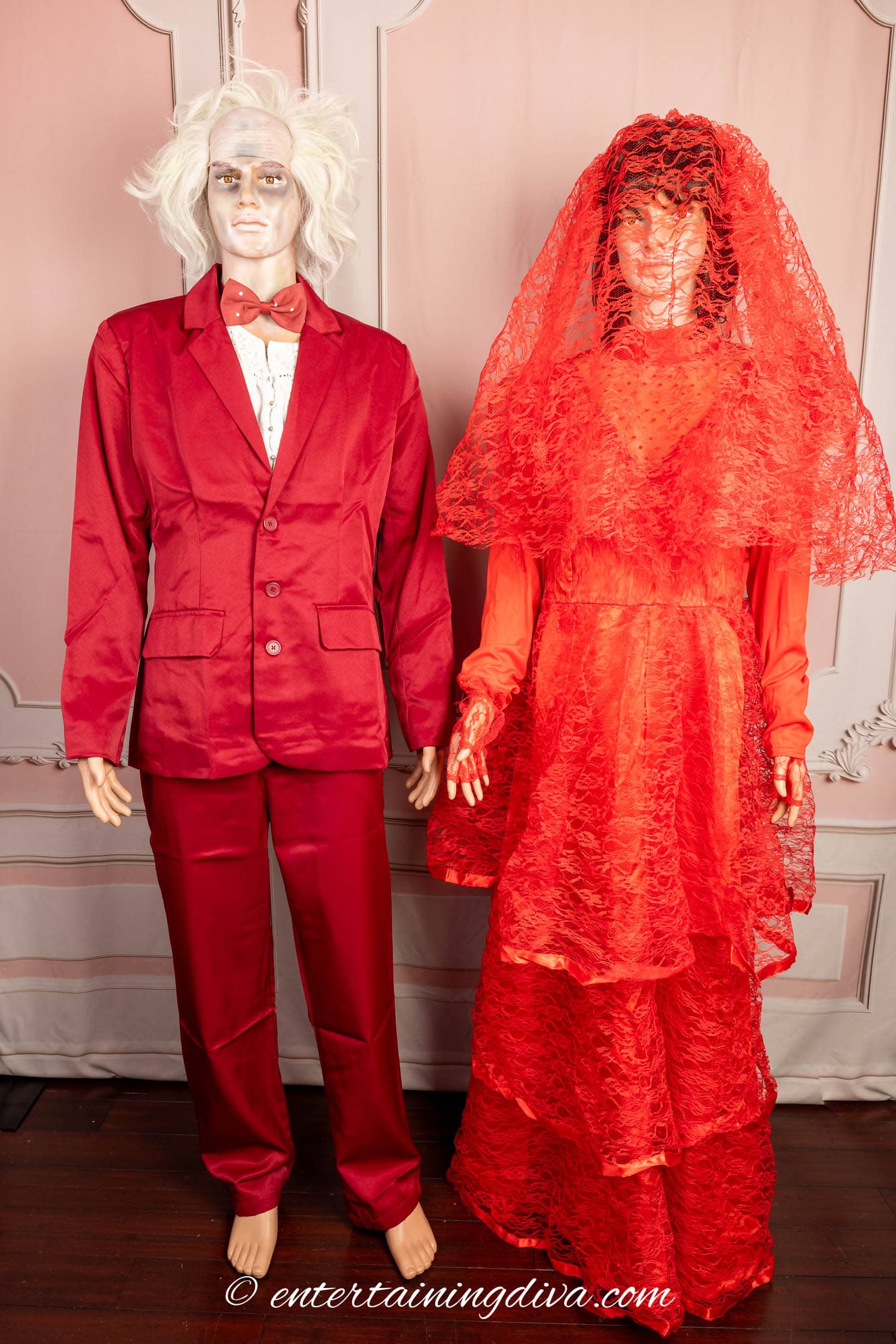 A couple of mannequins dressed as Beetlejuice and Lydia Deetz in their wedding outfits