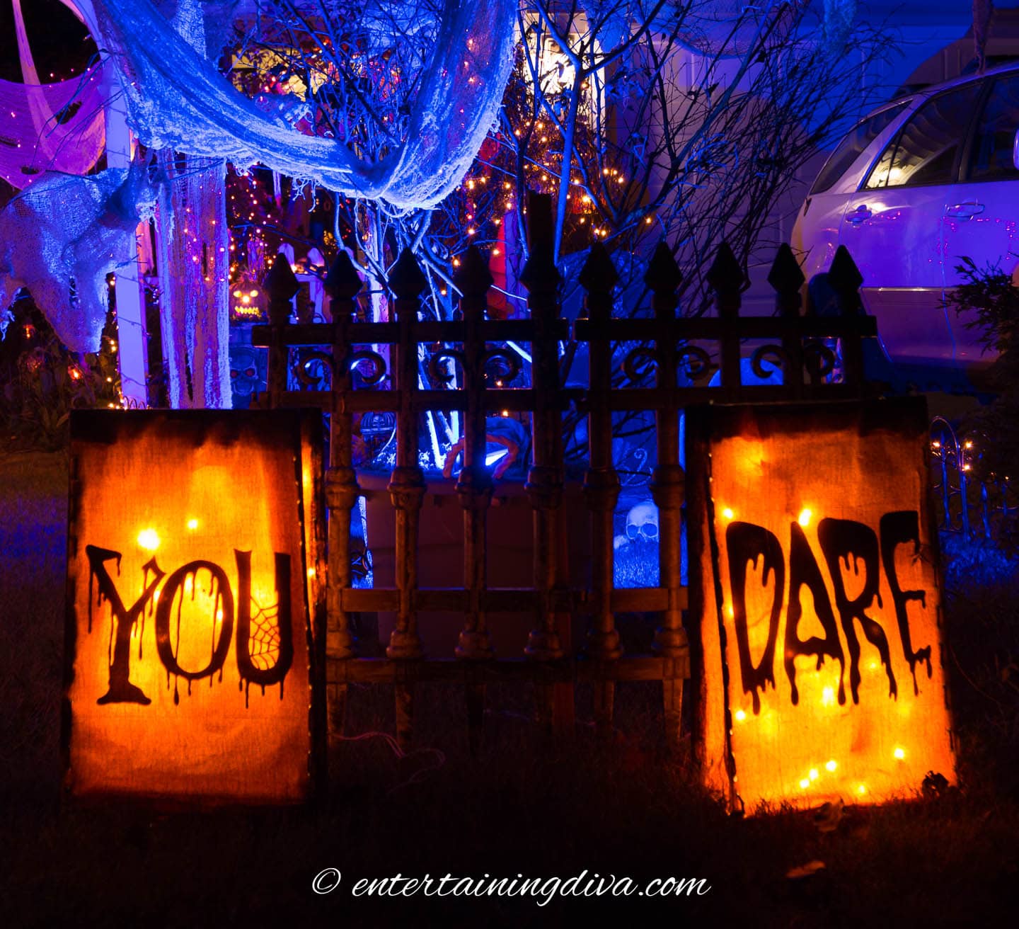 Halloween luminaries that say "You Dare"