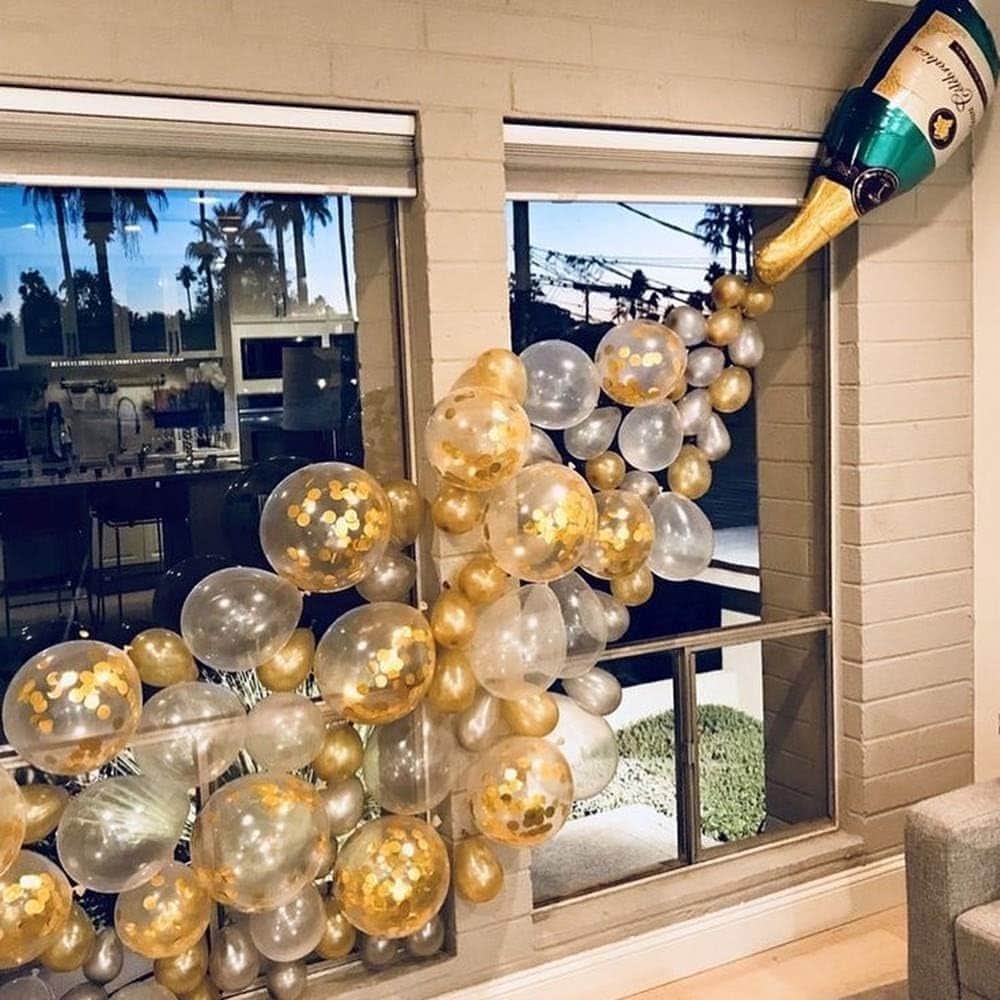 Champagne bottle balloon arch
