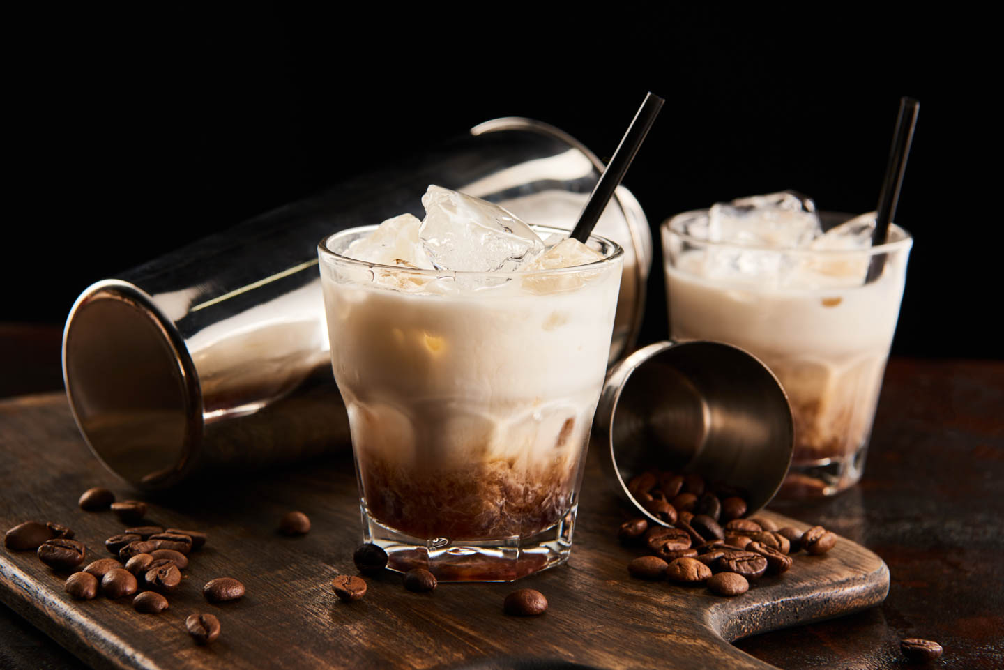 2 white Russians in front of a shaker
