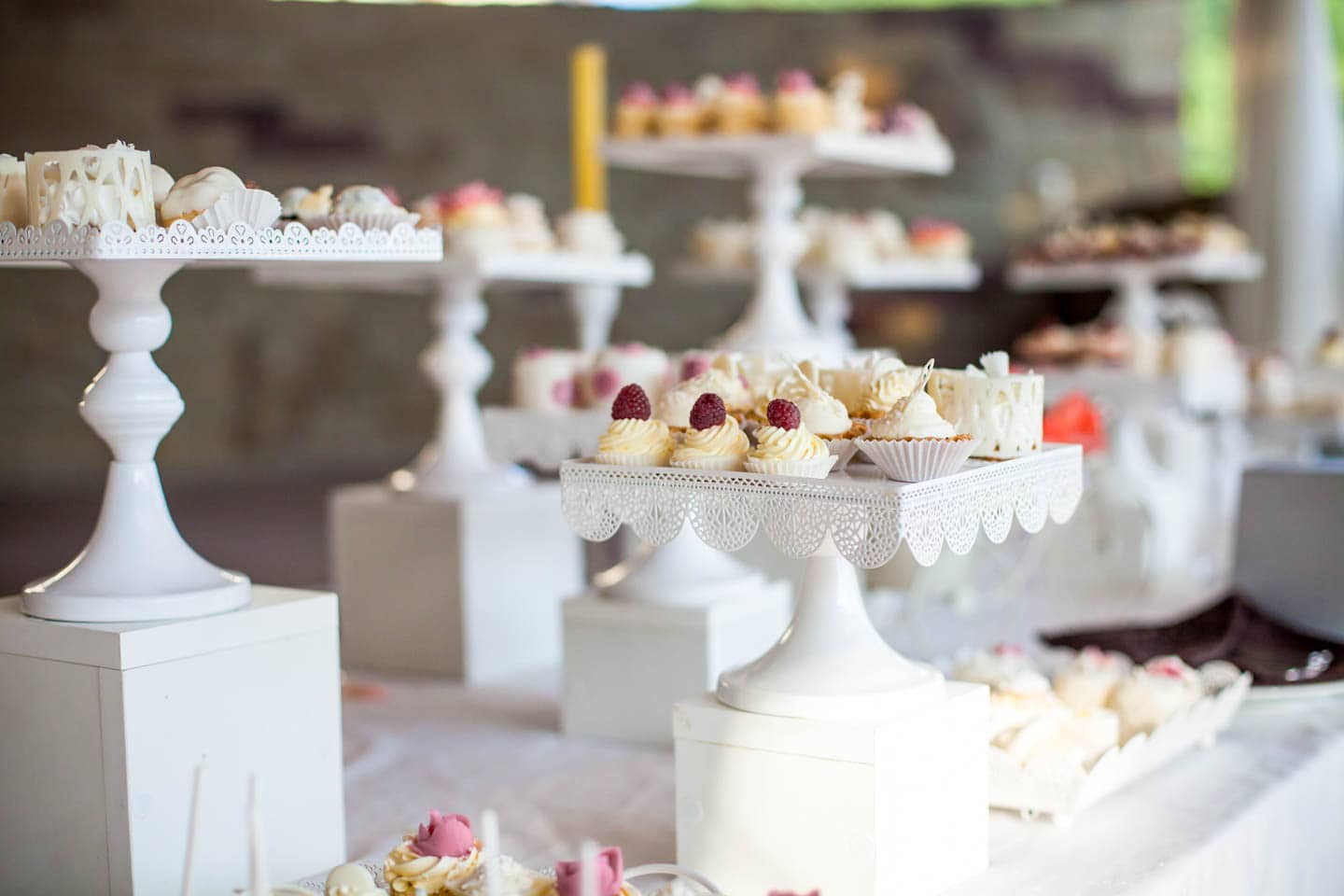 Winter wonderland dessert table with white cake stands