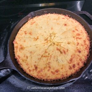 apple cheese cornbread in a skillet
