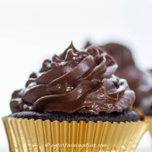 chocolate icing on top of a cupcake