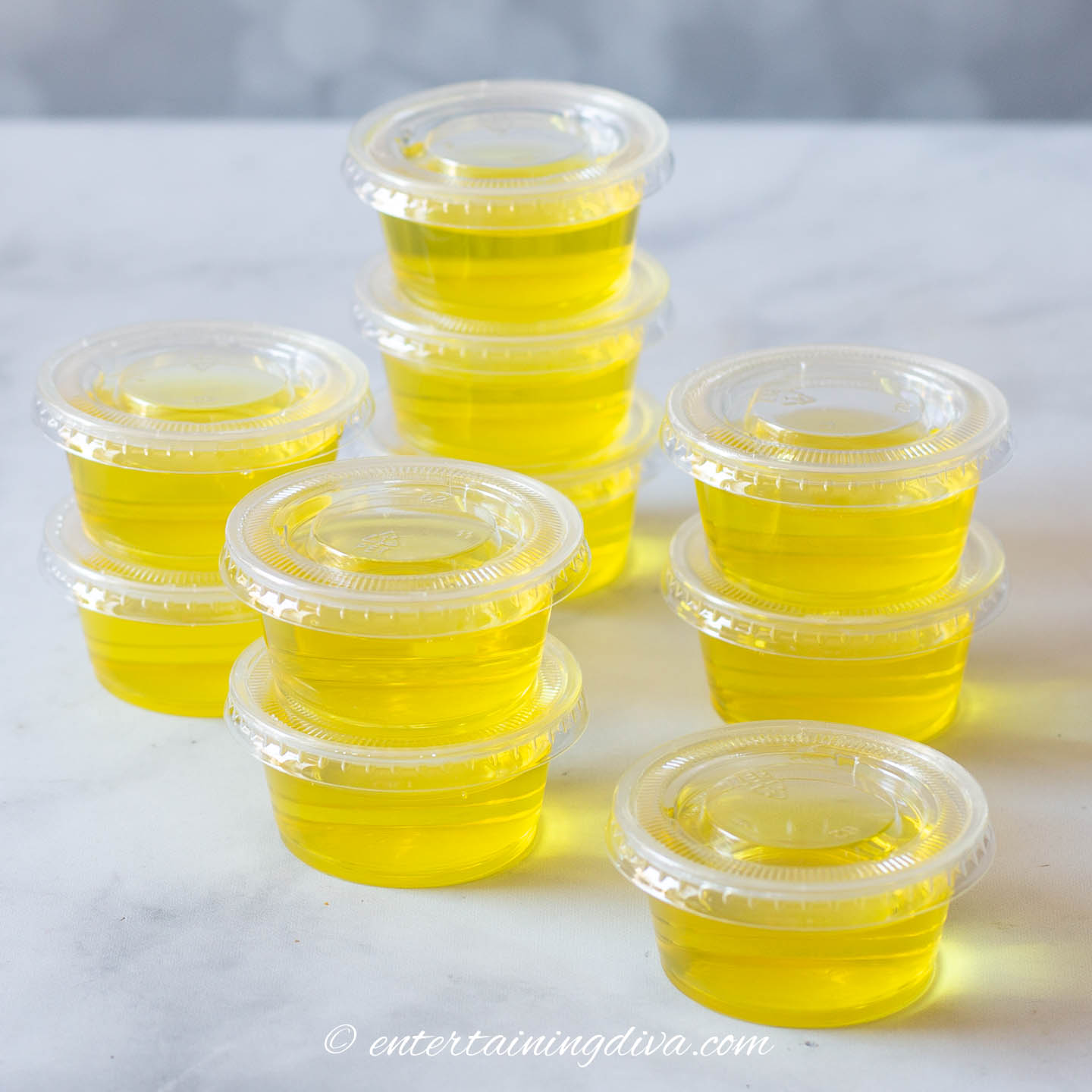 a stack of pina colada jello shots (made with pineapple jello and malibu rum)